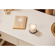 white spruce and grapefruit signature small tumbler candle on desk image number 2