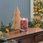 red apple wreath signature large tumbler candle on desk image number 4