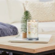 twinkling lights signature large tumbler candle on table image number 6