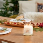 white spruce and grapefruit signature medium jar candle on table image number 3