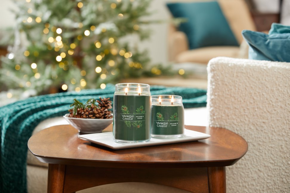 balsam and cedar signature large and medium jar candles on table