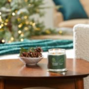 balsam and cedar signature medium jar candle on table image number 6