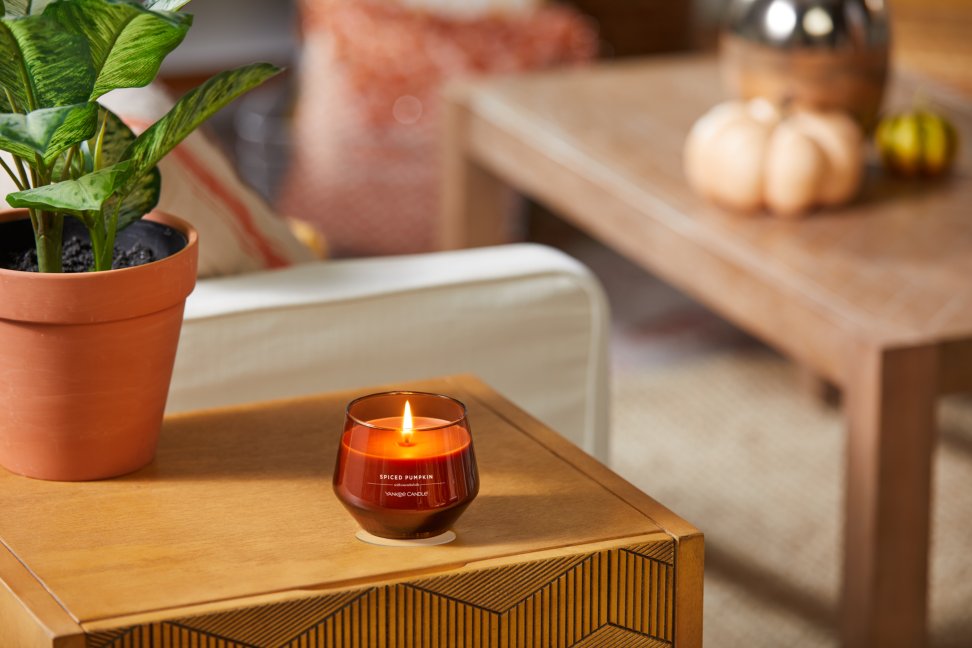 spiced pumpkin studio collection candle on table