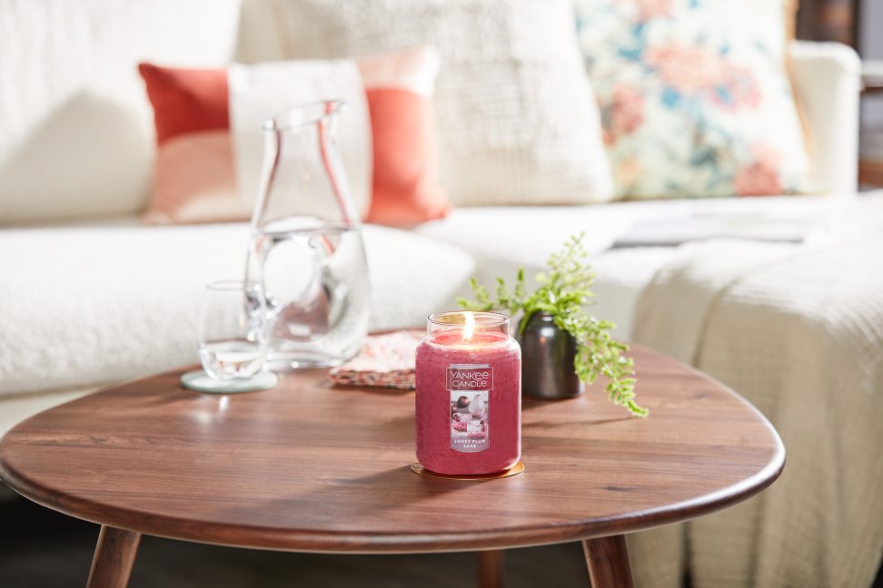 sweet plum sake original large jar candle on table