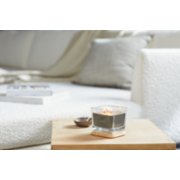 well living collection grounding vetiver and incense medium square candle on table image number 3