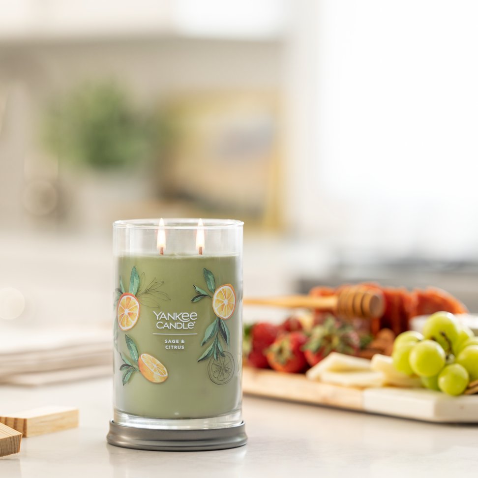 sage and citrus signature large tumbler candle on table