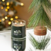 silver sage and pine signature medium jar candle on table image number 4