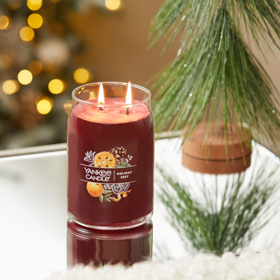 holiday zest signature large jar candle on table