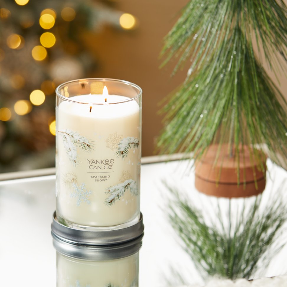 sparkling snow signature large tumbler candle on table
