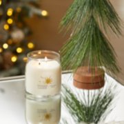 twinkling lights signature medium jar candle on table image number 3