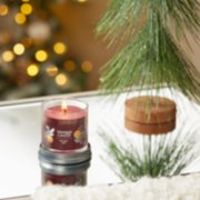 holiday zest signature small tumbler candle on table image number 4