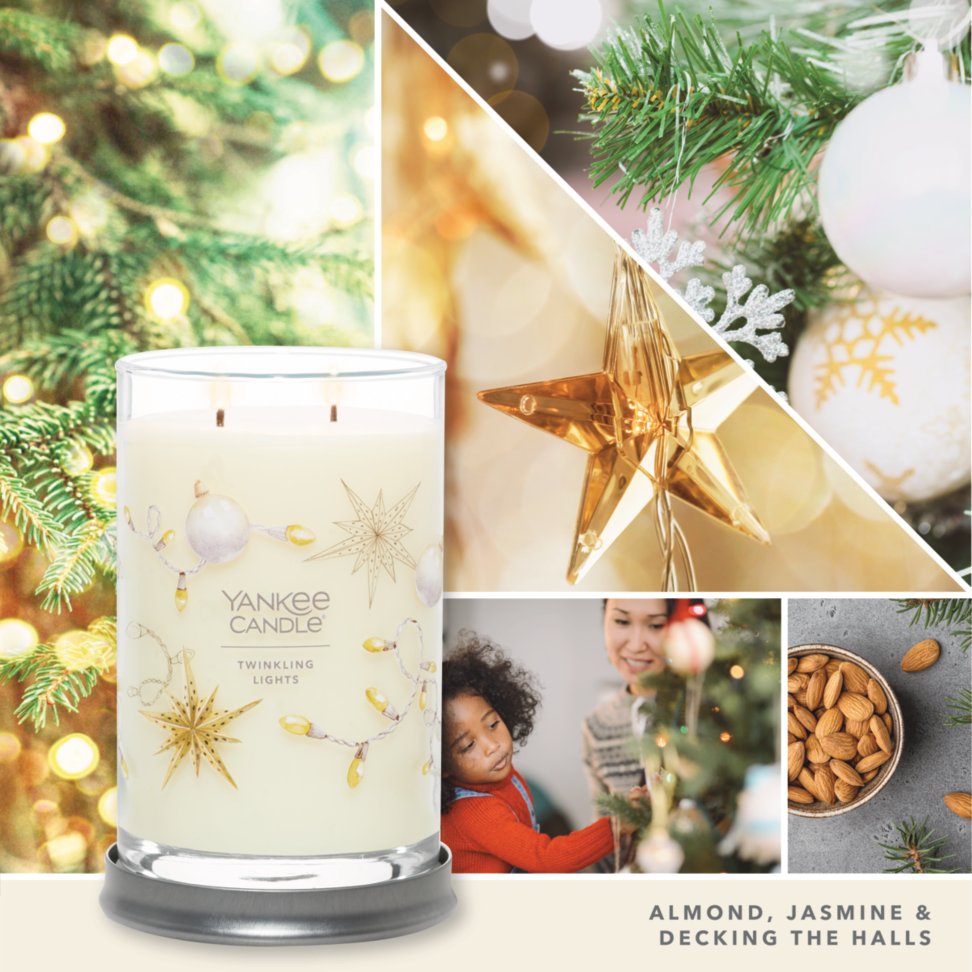 twinkling lights signature large tumbler candle with photo collage and text reading almond, jasmine and decking the halls