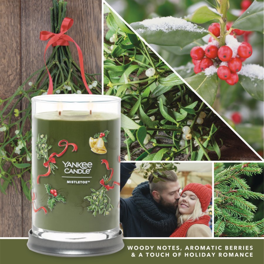 mistletoe signature large tumbler candle with photo collage and text reading woody notes, aromatic berries and a touch of holiday romance