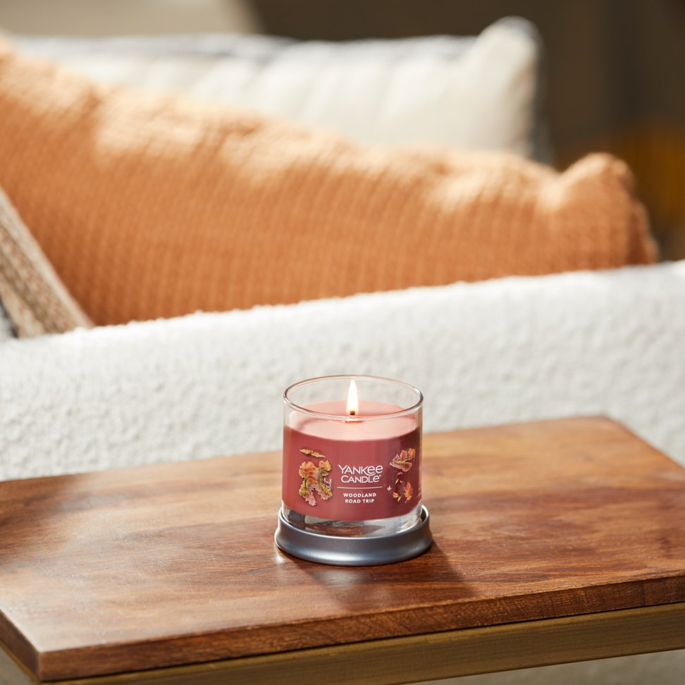 woodland road trip signature small tumbler candle on table