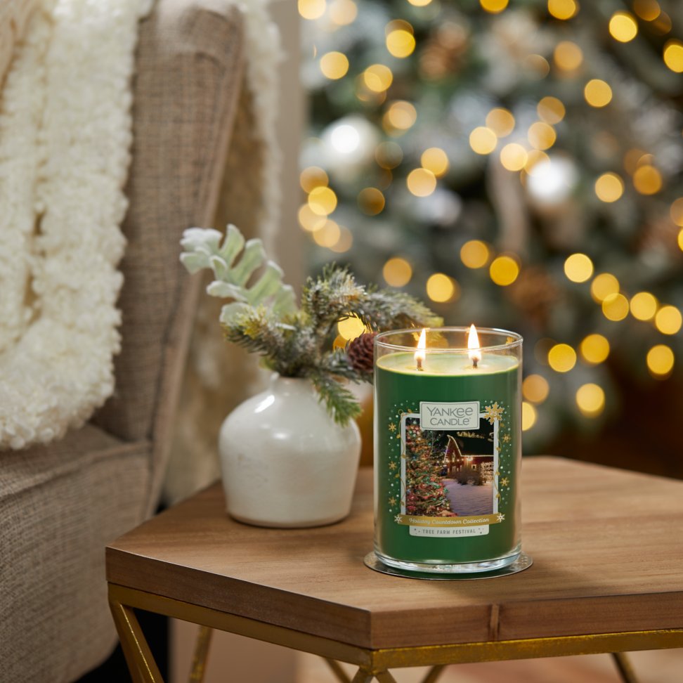 tree farm festival large two wick tumbler candle on table