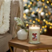 santa's cookies large two wick tumbler candle on table image number 3