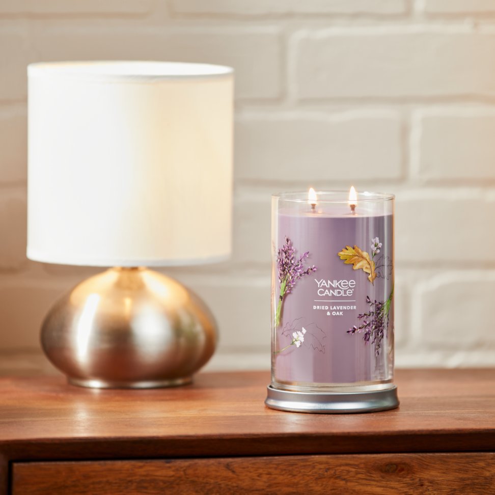 dried lavender and oak signature large tumbler candle on table