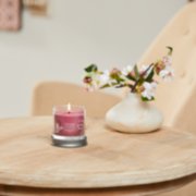 sweet plum sake signature small tumbler candle on table image number 6