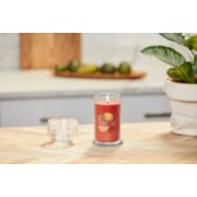lit kitchen spice signature medium pillar candle on wooden counter image number 4