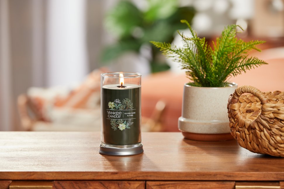 silver sage and pine signature medium perfect pillar tumbler candle on table