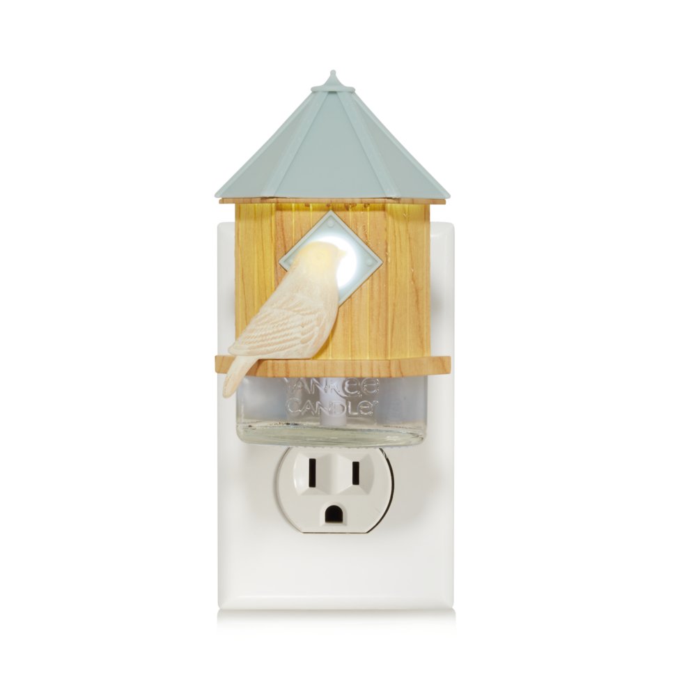 bird house scentplug diffuser with light and scentplug refill in outlet