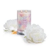wonder signature large tumbler candle 2023 scent of the year in a white background surrounded by flowers image number 5