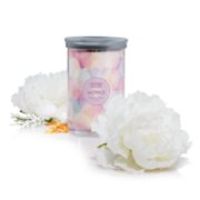 wonder signature large tumbler candle 2023 scent of the year in a white background surrounded by white flowers image number 4