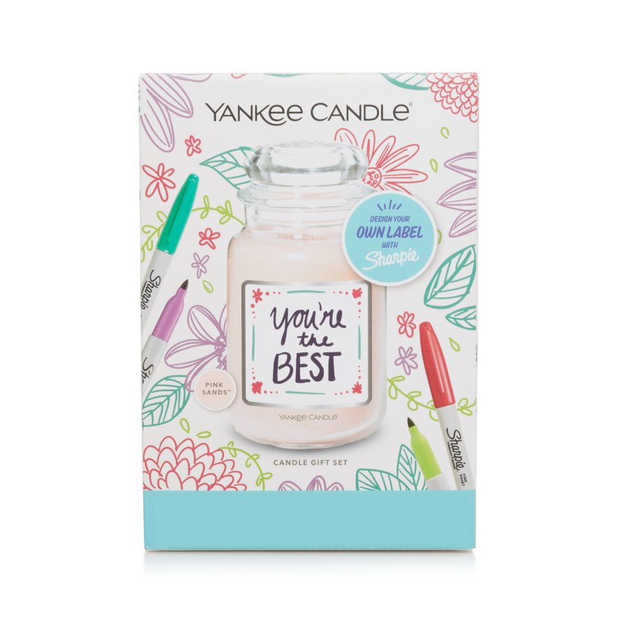 a create your own one-of-a-kind candle label gift set featuring a candle and colorful flowers displayed on the front