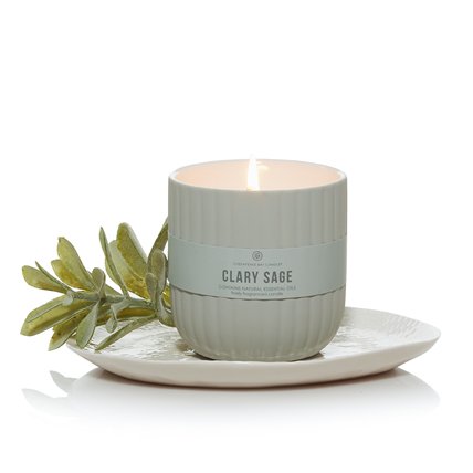 Clary Sage candle on saucer