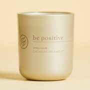 chesapeake bay candle intentions collection be positive citrus sugar medium two wick candle in a pastel yellow backdrop image number 1