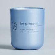 chesapeake bay candle intentions collection be present cypress sea minerals medium two wick candle in a pastel blue backdrop image number 1