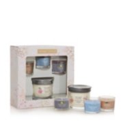 gift set with sakura blossom festival signature small tumbler candle and sakura blossom festival, amber and sandalwood, and sweet plum sake yankee candle minis, both inside and outside of packaging image number 3