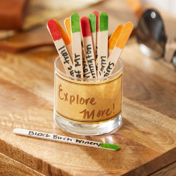 signature small tumbler candle upcycled into jar with popsicle sticks