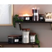 velvet tobacco lavender and cedar black peppercorn hourglass and ellipse candles placed on shelves image number 3