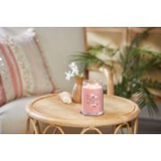pink sands signature large jar candle on table image number 2