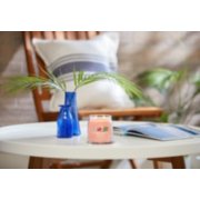 tropical breeze signature medium jar candle on table image number 3