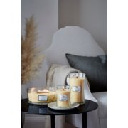 three woodwick lemongrass lily candles in various sizes on table image number 2