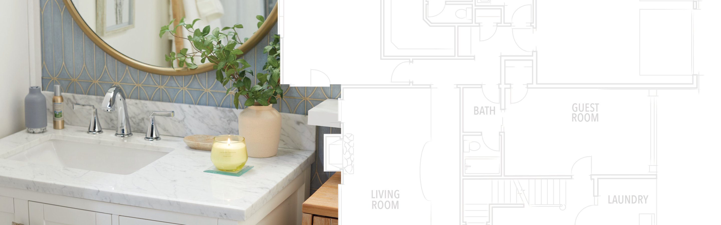 studio candle and vase with leaves on a bathroom sink counter with house blueprint
