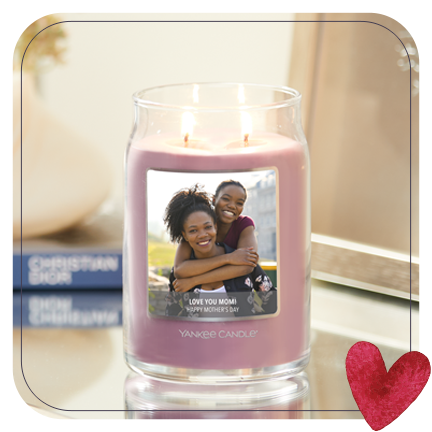a signature large jar candle with a happy mother's day personalized photo label on a table