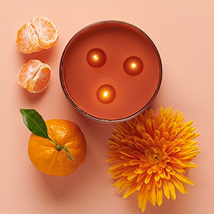 3 wick candle with flower and orange