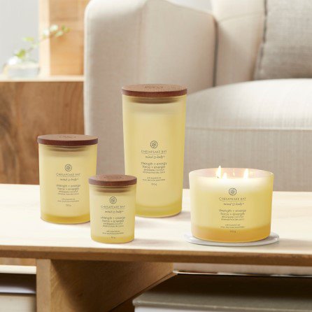 A group photo of all Chesapeake Bay Candle® sizes in the fragrance Strength + Energy