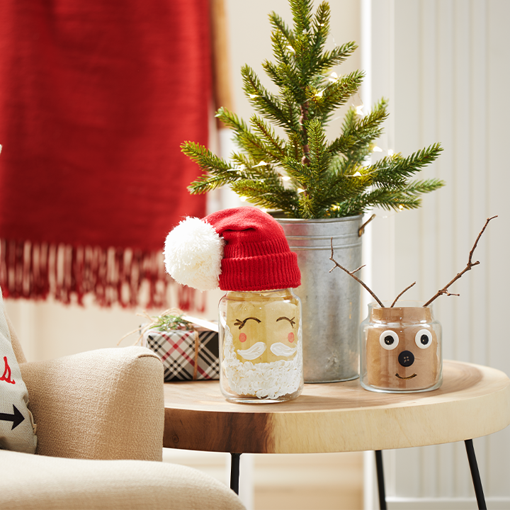 holiday themed glass jars on table